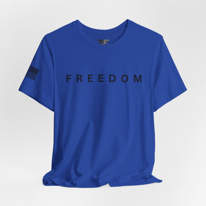 Blue t-shirt with 'FREEDOM' printed on it against a light gray background