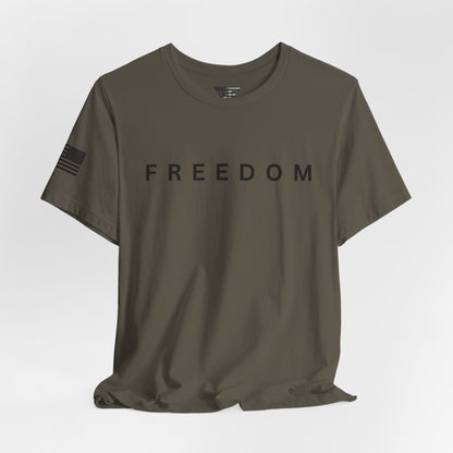 Olive green t-shirt with 'FREEDOM' printed on it against a white background