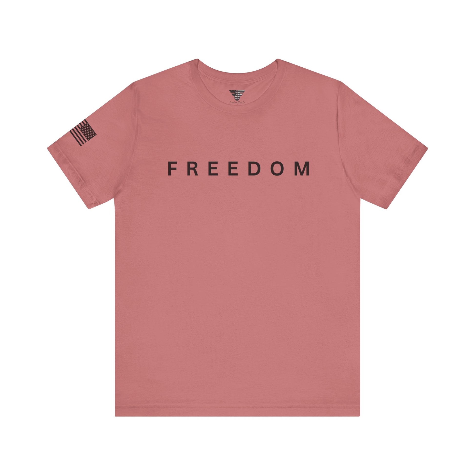 Pink t-shirt with 'FREEDOM' text on a white background