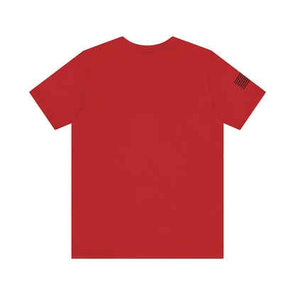 Red t-shirt with a small flag patch on the sleeve against a white background