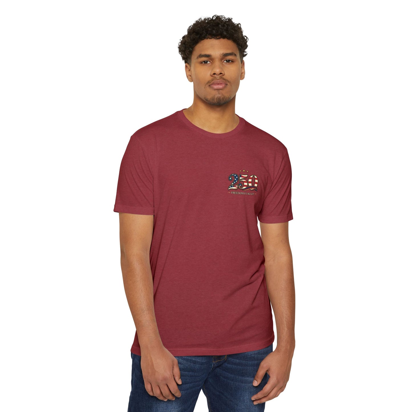Man wearing a maroon t-shirt with a small logo on a white background
