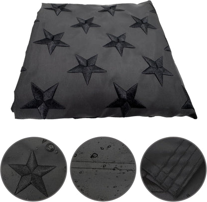 Black star-patterned fabric with close-up details on a white background