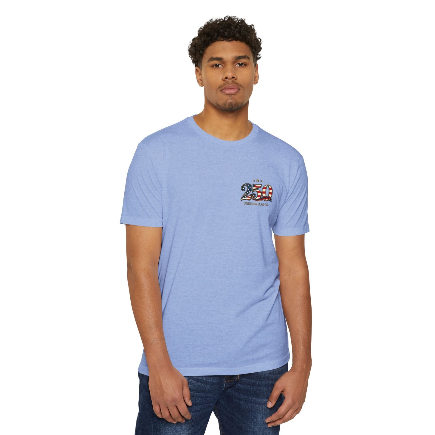 Man wearing a light blue t-shirt with a logo on a white background