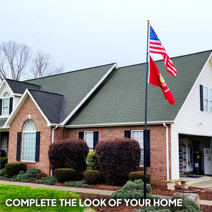 Two-story house with American and state flags on a clear day