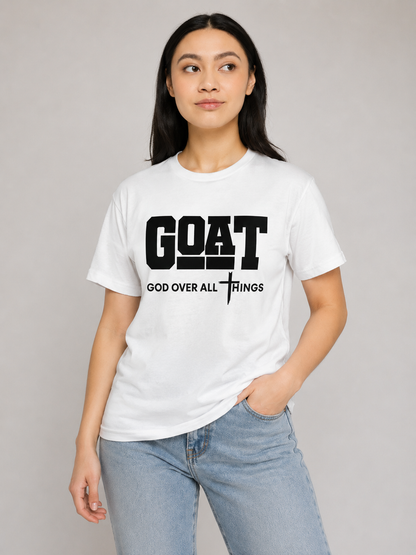 Person wearing a white t-shirt with 'GOAT God Over All Things' text on a plain background