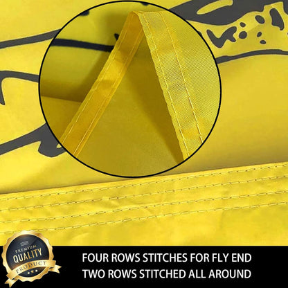 Close-up of a yellow fabric with stitching details and a premium quality badge.