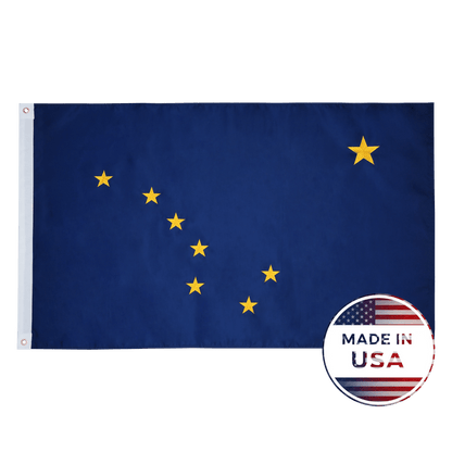 Alaska state flag with yellow stars on a blue background, featuring 'Made in USA' label.