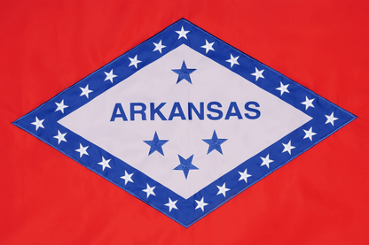 Flag of Arkansas with blue stars and 'ARKANSAS ' text on a red background