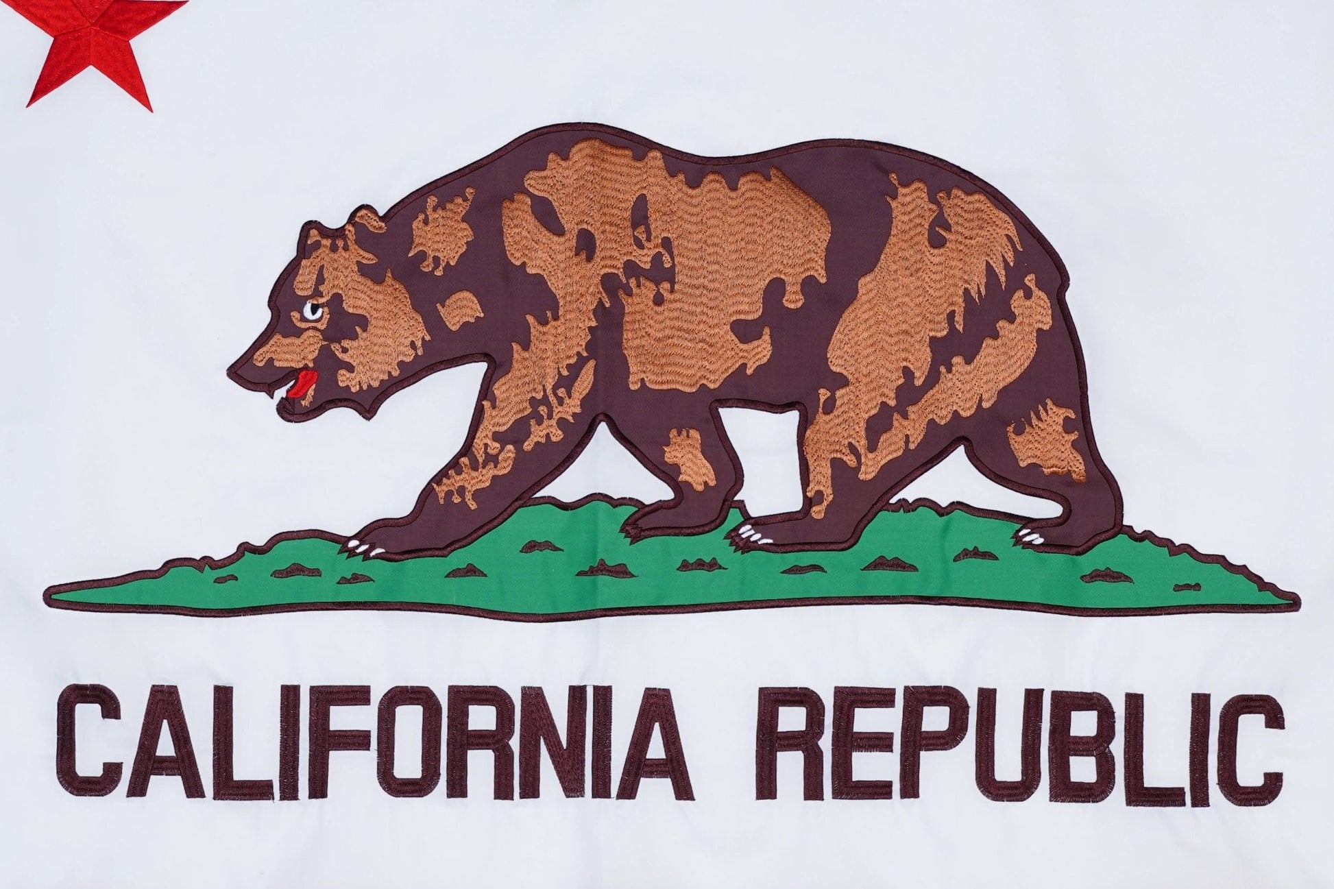 California Republic flag with bear and star on a white background
