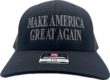 Dark MAGA Cap with sleek, understated design and bold embroidery, ideal for a modern patriotic statement.