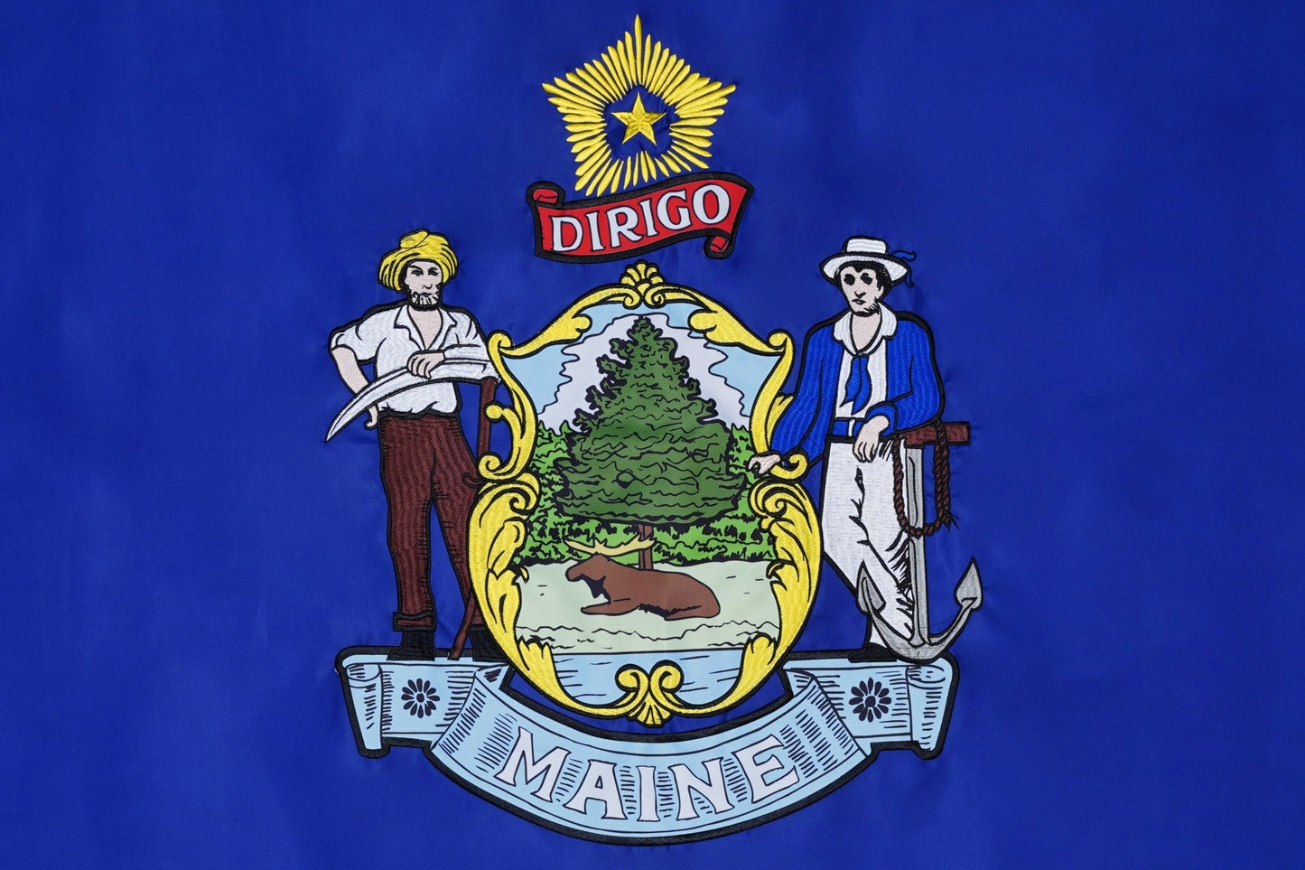Maine state flag embroidered detail and fabric construction