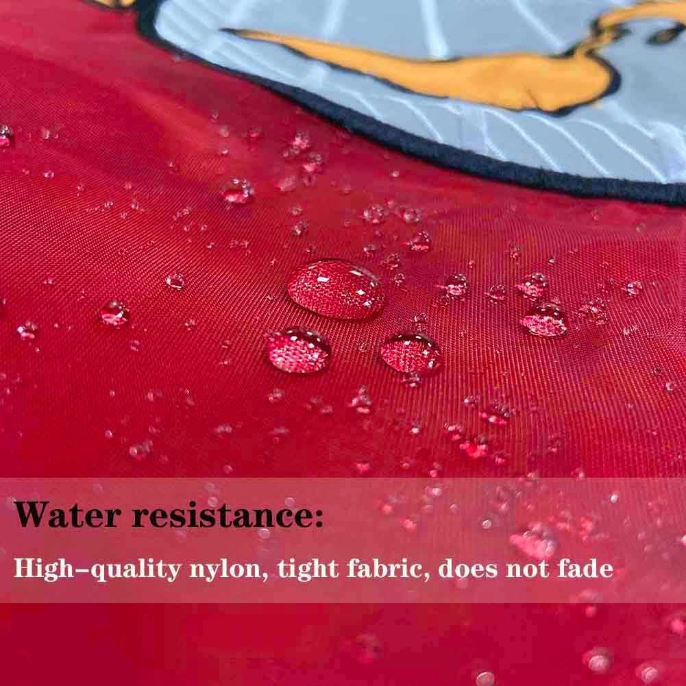 Red fabric with water droplets and a butterfly design, highlighting water resistance.
